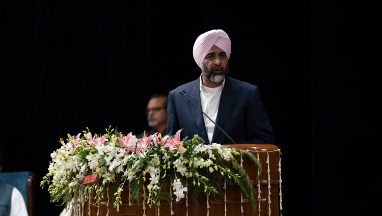 Government of Punjab Finance Minister Manpreet Singh Badal welcoming the audience and participants at the start of the Inter-Faith Conclave at Guru Nanak Dev University in Amritsar, Punjab, India on November 9, 2019. Photo by Tenzin Choejor