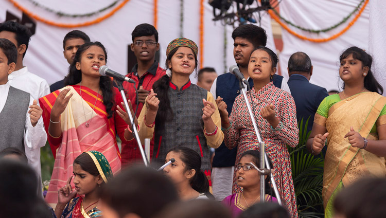 Students from Pratyek, an NGO educating and looking after underprivileged children, presenting a rap about children’s rights at the start of His Holiness the Dalai Lama's talk at St. Columba's School in New Delhi, India on November 20, 2019. Photo by Tenzin Choejor