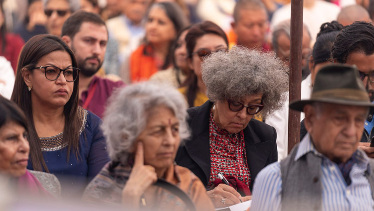 Members of the audience listening to His Holiness the Dalai Lama speaking at Tushita Delhi’s 40th Anniversary celebration held at St. Columba's School in New Delhi, India on November 20, 2019. Photo by Tenzin Choejor Members of the audience listening to His Holiness the Dalai Lama speaking at Tushita Delhi’s 40th Anniversary celebration held at St. Columba's School in New Delhi, India on November 20, 2019. Photo by Tenzin Choejor