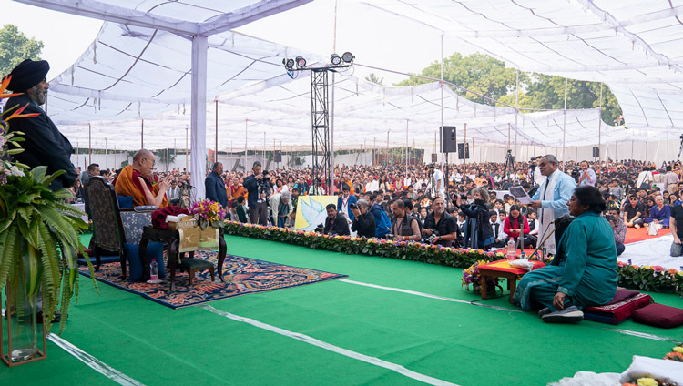 Brother EL Miranda, Principal of St Columba’s School offering words of thanks at the conclusion of His Holiness the Dalai Lama's talk in New Delhi, India on November 20, 2019. Photo by Tenzin Choejor Brother EL Miranda, Principal of St Columba’s School offering words of thanks at the conclusion of His Holiness the Dalai Lama's talk in New Delhi, India on November 20, 2019. Photo by Tenzin Choejor