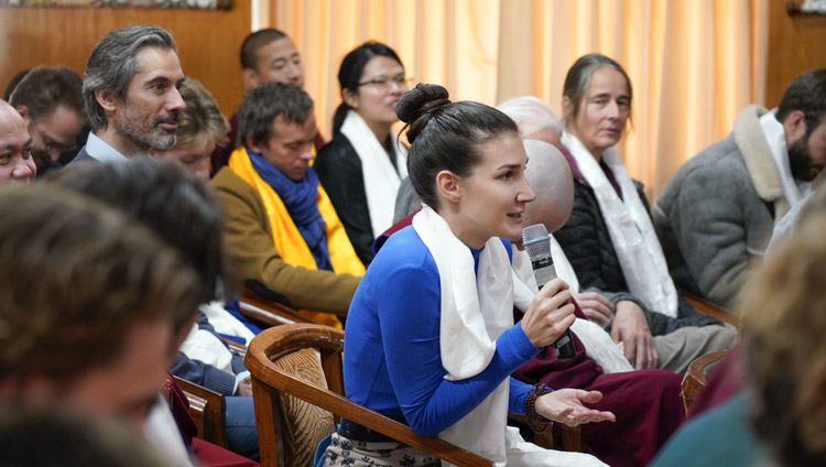 A trainee translator asking His Holiness the Dalai Lama a question during his meeting with Tibetan Studies' students at his residence in Dharamsala, HP, India on December 2, 2019. Photo by Ven Tenzin Jamphel