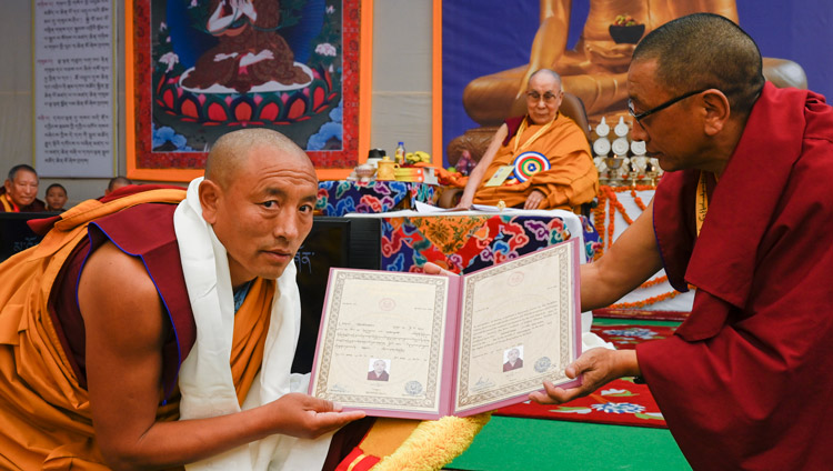 Karma Gelek Yuthok, Kalon for Religion & Culture presenting Certificates of Graduation at the Symposium on Monastic Education to mark the 25th anniversary of Kirti Jepa Dratsang in Dharamsala, HP, India on December 7, 2019. Photo by Manuel Bauer