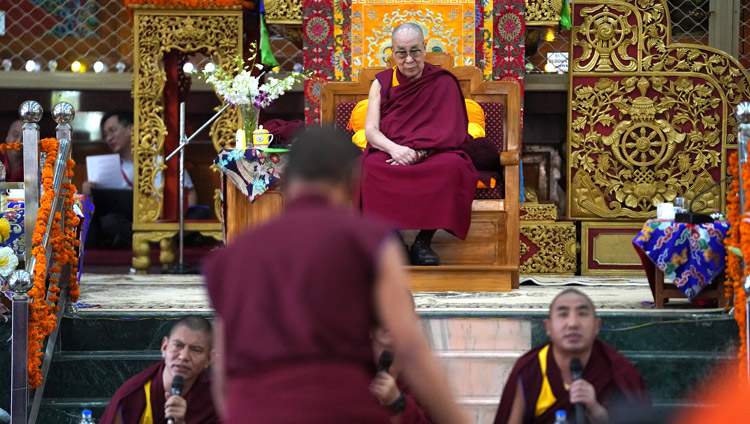 His Holiness the Dalai Lama listening attentively to monks debating Buddhist philosophy at Drepung Gomang Assembly Hall in Mundgod, Karnataka, India on December 15, 2019. Photo by Lobsang Tsering His Holiness the Dalai Lama listening attentively to monks debating Buddhist philosophy at Drepung Gomang Assembly Hall in Mundgod, Karnataka, India on December 15, 2019. Photo by Lobsang Tsering