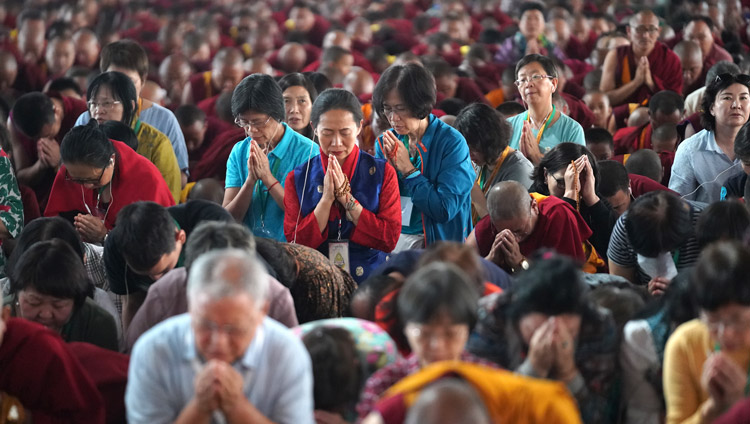 Members of the congregation taking the bodhisattva vows from His Holiness the Dalai Lama at the Drepung Loseling debate courtyard in Mundgod, Karnataka, India on December 16, 2019. Photo by Lobsang Tsering