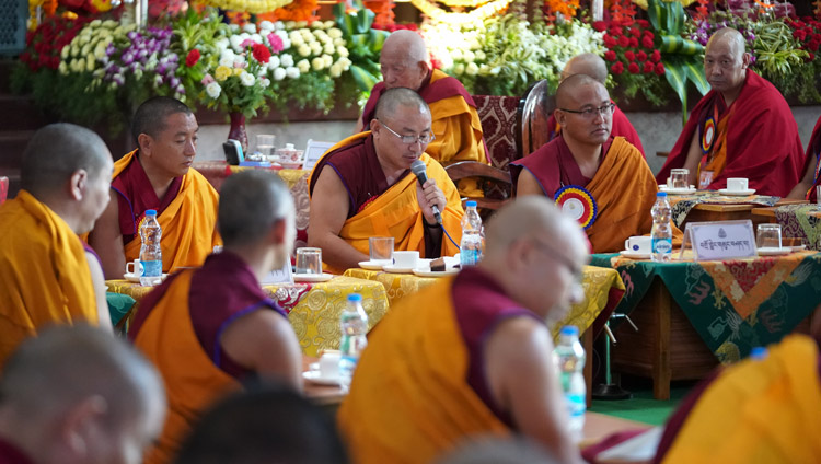 A monk scholar delivering his presentation during the Symposium on Aryadeva’s ‘400 Verses on the Middle Way’ at the Drepung Loseling Assembly Hall in Mundgod, Karnataka, India on December 17, 2019. Photo by Lobsang Tsering