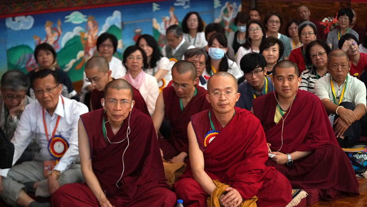 Members of the audience, many listening to translations on FM, following the proceedings at the Symposium on Aryadeva’s ‘400 Verses on the Middle Way’ at the Drepung Loseling Assembly Hall in Mundgod, Karnataka, India on December 17, 2019. Photo by Lobsang Tsering