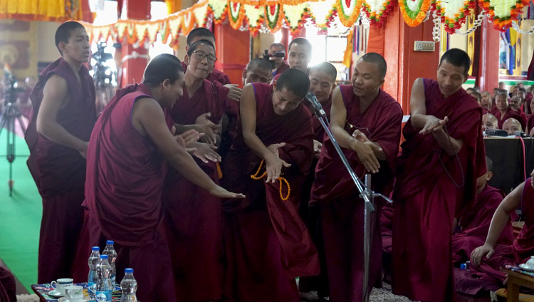 A group of challengers debating Buddhist philosophy at the Gaden Shartse Assembly Hall in Mundgod Karnataka, India on December 19, 2019. Photo by Lobsang Tsering