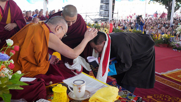 His Holiness the Dalai Lama thanking the The Speaker of the Tibetan Parliament in Exile for his talk at the celebration of the 600th anniversary of Jé Tsongkhapa's passing away and enlightenment at Ganden Lachi in Mundgod, Karnataka, India on December 21, 2019. Photo by Lobsang Tsering