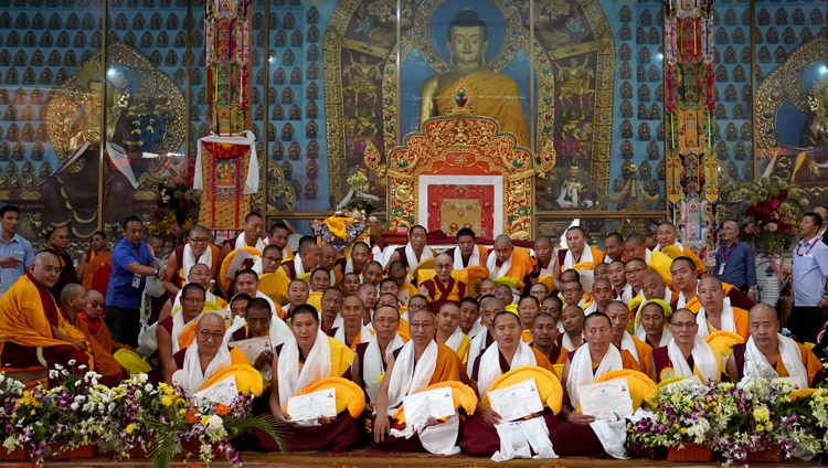 His Holiness the Dalai Lama posing for group photos with newly graduated Geshe Lharamapas at Gaden Jangtse Monastery in Mundgod, Karnataka, India on December 22, 2019. Photo by Lobsang Tsering