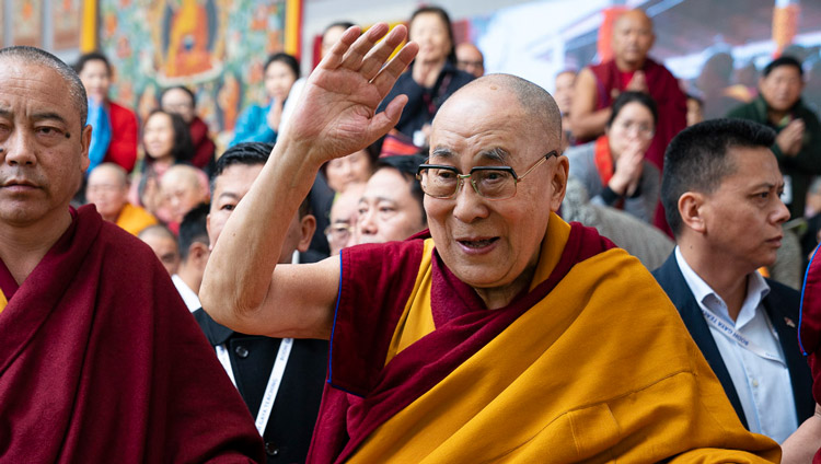 His Holiness the Dalai Lama waving to the crowd as he departs at the end of his teaching at the Kalachakra Ground in Bodhgaya, Bihar, India on January 2, 2020. Photo by Tenzin Choejor
