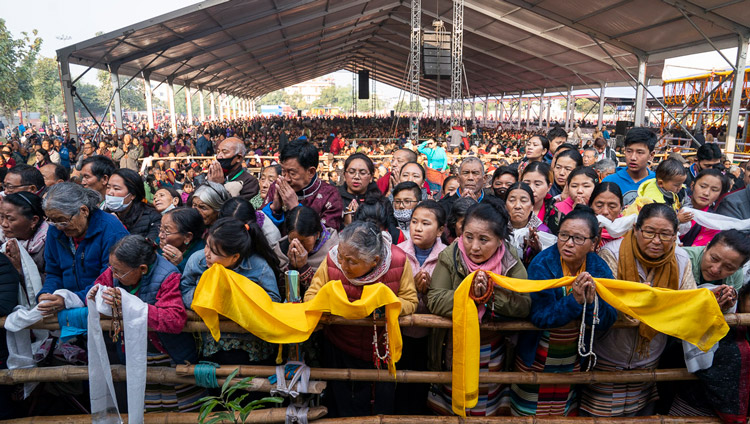 Members of the crowd waiting for His Holiness the Dalai Lama's arrival at the Kalackakra Ground in Bodhgaya, Bihar, India on January 6, 2020. Photo by Tenzin Choejor