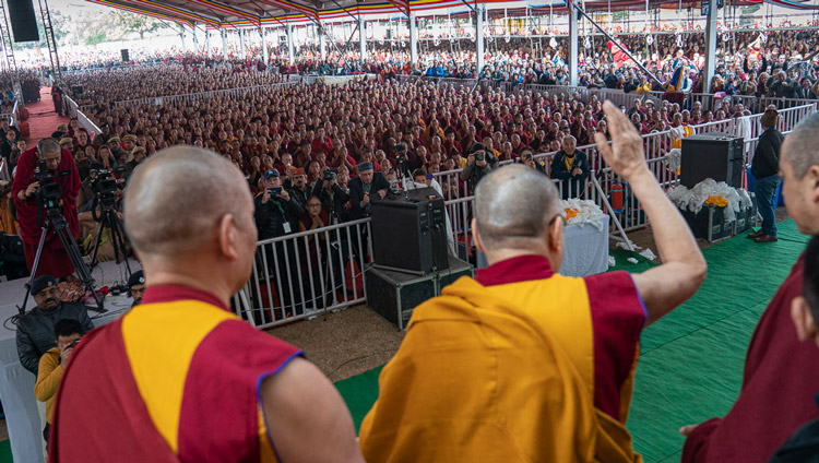 His Holiness the Dalai Lama waving to the crowd as he departs from the Kalachakra Ground at the conclusion of his teachings in Bodhgaya, Bihar, India on January 6, 2020. Photo by Tenzin Choejor