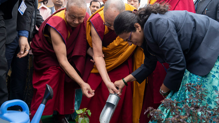 His Holiness the Dalai Lama planting a sapling to commemorate his visit to the Indian Institute of Management (IIM) on the campus of Magadh University in Bodhgaya, Bihar, India on January 14, 2020. Photo by Lobsang Tsering