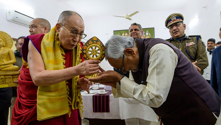 His Holiness the Dalai Lama offering Bihar Chief Minister Nitish Kumar a Dharma Wheel at the conclusion of their meeting at the Chief Minister's residence in Patna, Bihar, India on January 17, 2020. Photo by Lobsang Tsering His Holiness the Dalai Lama offering Bihar Chief Minister Nitish Kumar a Dharma Wheel at the conclusion of their meeting at the Chief Minister's residence in Patna, Bihar, India on January 17, 2020. Photo by Lobsang Tsering