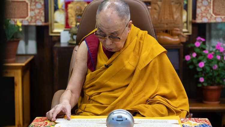 His Holiness the Dalai Lama reading from Tsongkhapa's 'In Praise of Dependent Arising' on the final day of his teaching requested by young Tibetans by video link from his residence in Dharamsala, HP, India on August 6, 2020. Photo by Ven Tenzin Jamphel