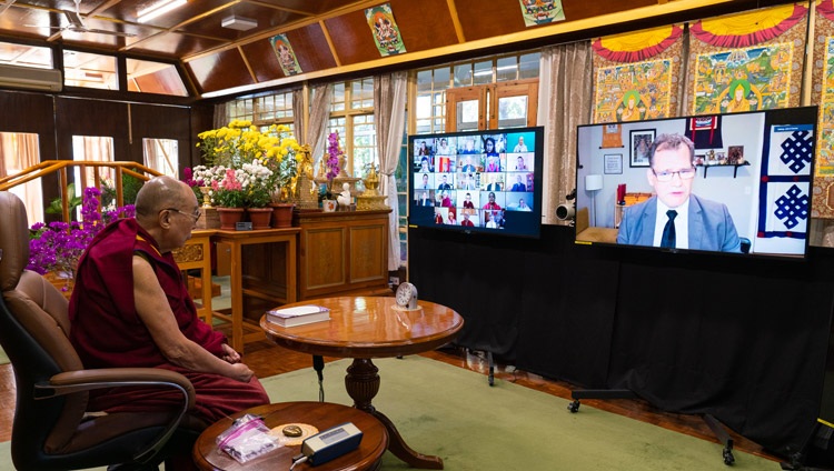 His Holiness the Dalai Lama listening to John Dunne talk about the essays he had written to introduce each chapter of the book during the virtual book launch of "Science and Philosophy in the Indian Buddhist Classics, Vol. 2 - The Mind" at his residence in Dharamsala, HP, India on November 13, 2020. Photo by Ven Tenzin Jamphel