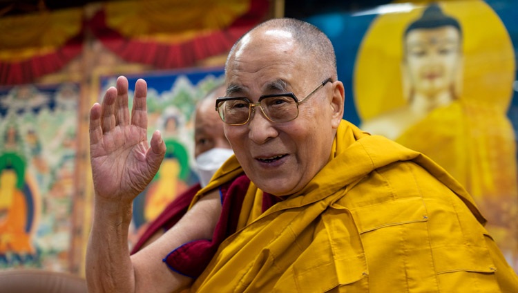His Holiness the Dalai Lama waving to the virtual audience as he arrives for his online teaching from his residence in Dharamsala, HP, India on February 8, 2021. Photo by Ven Tenzin Jamphel His Holiness the Dalai Lama waving to the virtual audience as he arrives for his online teaching from his residence in Dharamsala, HP, India on February 8, 2021. Photo by Ven Tenzin Jamphel