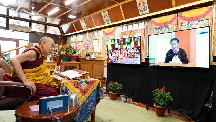 A member of the audience gathered at Thiksé Monastery in Ladakh asking His Holiness the Dalai Lama a question on the second day of his online teachings from his residence in Dharamsala, HP, India on July 14, 2021. Photo by Ven Tenzin Jamphel