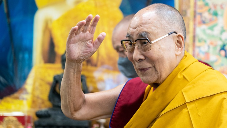 His Holiness the Dalai Lama waving to the virtual audience as he arrives for the second day of his conversation with USIP Generation Change Fellows at his residence in Dharamsala, HP, India on October 15, 2021. Photo by Ven Tenzin Jamphel