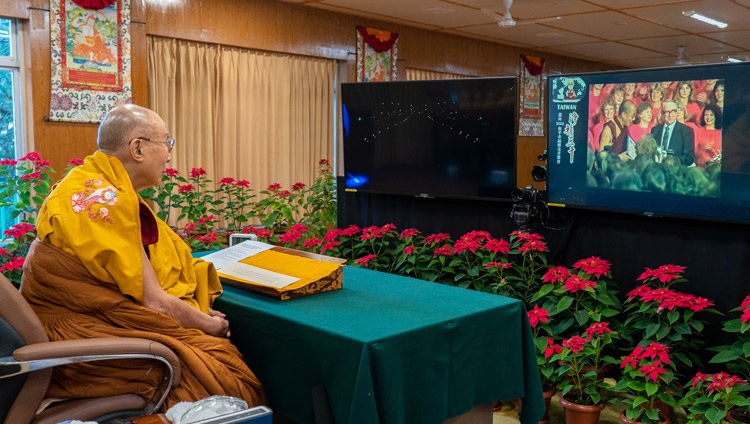 His Holiness the Dalai Lama watching a video of the ceremony where he was awarded the Nobel Peace Prize in 1989 at the start of the program organized by members of the Gaden Shartse Centre, Taiwan on December 11, 2021. Photo by Ven Tenzin Jamphel