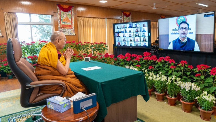 Prof Dheeraj Sharma, Director of the Indian Institute of Management, Rohtak, welcoming His Holiness the Dalai Lama to thier program on ‘Facing Challenges with Compassion & Wisdom’ online from his residence in Dharamsala, HP, India on December 23, 2021. Photo by Ven Tenzin Jamphel