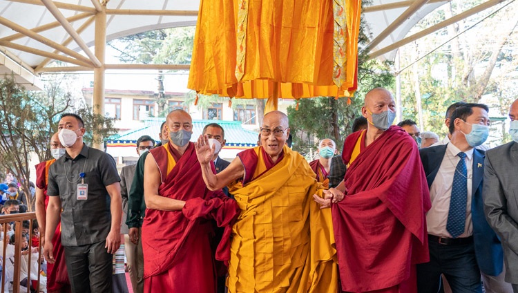 His Holiness the Dalai Lama walking through the courtyard of the Main Tibetan Temple in Dharamsala, HP, India on March 18, 2022. Photo by Ven Tenzin Jamphel
