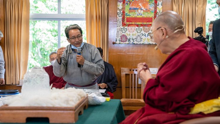 Climate mitigation innovator Sonam Wangchuk describing the block of ice taken from a glacier on the Kardungla pass in Ladakh to highlight the urgency of climate change to His Holiness the Dalai Lama during their meeting in Dharamsala, HP, India on April 22, 2022. Photo by Tenizn Choejor