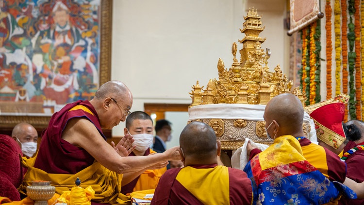 The incumbent Sakya Throne-holder, the Sakya Trizin, Gyana Vajra Rinpoché offering His Holiness the Dalai Lama a large mandala during the Long Life Offering at the Main Tibetan Temple in Dharamsala, HP, India on May 25, 2022. Photo by Tenzin Choejor