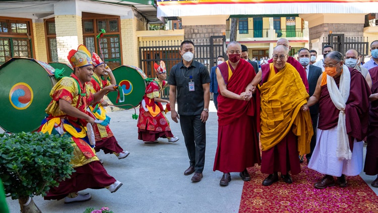His Holiness the Dalai Lama being escorted to the Main Tibetan Temple for a Long Life Offering presented by members of the Sakya Tradition of Tibetan Buddhism in Dharamsala, HP, India on May 25, 2022. Photo by Tenzin Choejor