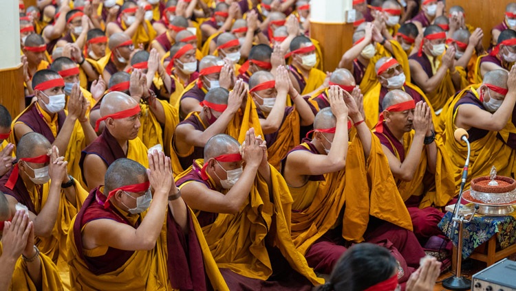 Monks sitting in the Main Tibetan Temple following His Holiness the Dalai Lamas instructions as he bestows the Avalokiteshvara Jinasagara Empowerment in Dharamsala, HP, India on June 14, 2022. Photo by Tenzin Choejor