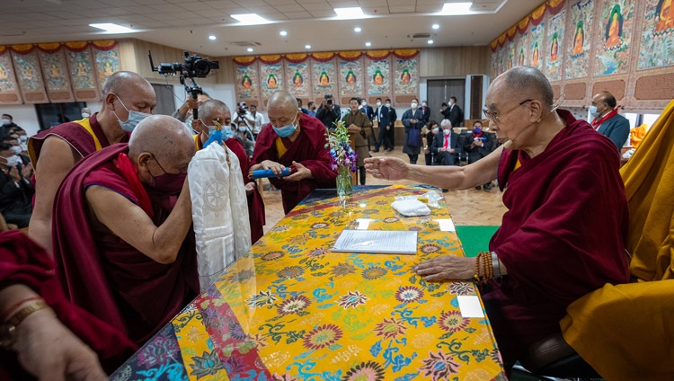 Ven Samdhong Rnpoche presenting traditional offerings to His Holiness the Dalai Lama at the start of the inauguration ceremony of the Dalai Lama Library and Archives in Dharamsala, HP, India on July 6, 2022. Photo by Tenzin Choejor