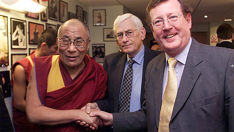 His Holiness the Dalai Lama greets then Northern Ireland First Minister David Trimble and Deputy First Minister Seamus Mallon at Belfast in 2000.