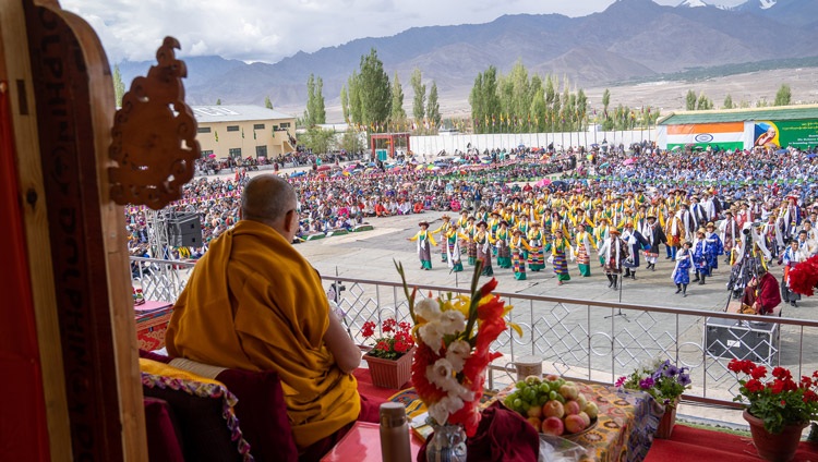 His Holiness the Dalai Lama watching students from TCV Choglamsar performing before his address to Tibetans of Ladakh in Leh, Ladakh, UT, India on August 7, 2022. Photo by Tenzin Choejor