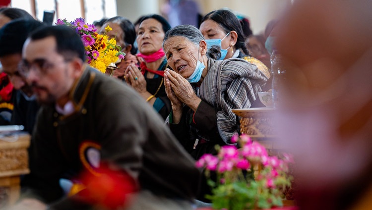Members of the local community in the audience listening to His Holiness the Dalai Lama speaking during his visit to the Ladakh Gonpa Association community prayer hall in Leh, Ladakh, UT, India on August 25, 2022. Photo by Tenzin Choejor