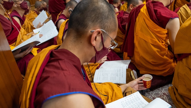 Monks from Taiwan following the text on the third day of His Holiness the Dalai Lama's teaching at the Main Tibetan Temple in Dharamsala, HP, India on October 5, 2022. Photo by Tenzin Choejor