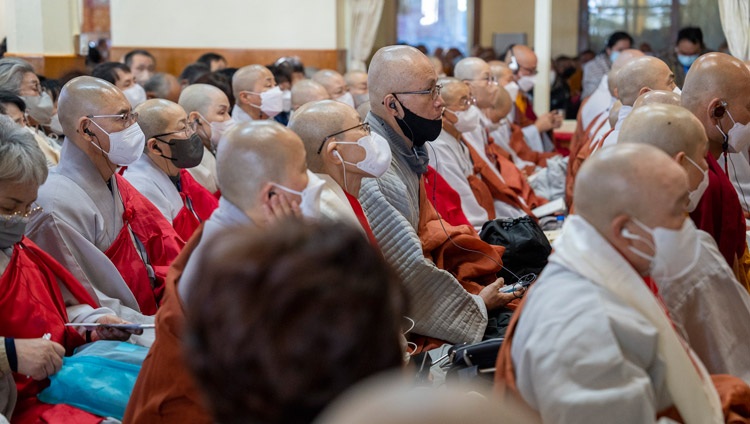 Some of the group of 3350 monks, nuns and lay-people from Korea who had requested His Holiness the Dalai Lama to teach Nagarjuna’s ‘Fundamental Wisdom of the Middle Way’ listening to the teachings at the Main Tibetan Temple in Dharamsala, HP, India on November 25, 2022. Photo by Tenzin Choejor