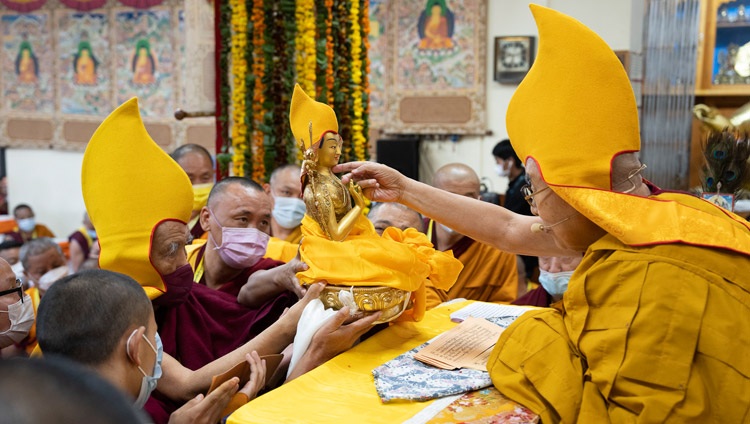 Ganden Tri Rinpoché presenting offerings to His Holiness the Dalai Lama during the Long Life Offering ceremony at the Main Tibetan Temple in Dharamsala, HP, India on November 30, 2022. Photo by Tenzin Choejor