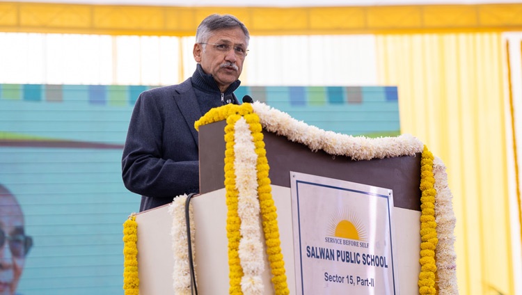 Chairman of the Salwan Education Trust, Sushil Dutt Salwan, delivering his welcome address at the start of the program with His Holiness the Dalai Lama at Salwan Public School in Gurugram, India on December 21, 2022. Photo by Tenzin Choejor
