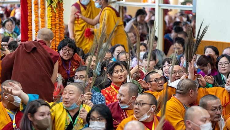 Initiates holding kusha grass as the Preliminary Procedures for the Chakrasamvara Empowerment conclude at the Tsuglagkhang in Dharamsala, HP, India on March 8, 2023. Photo by Tenzin Choejor