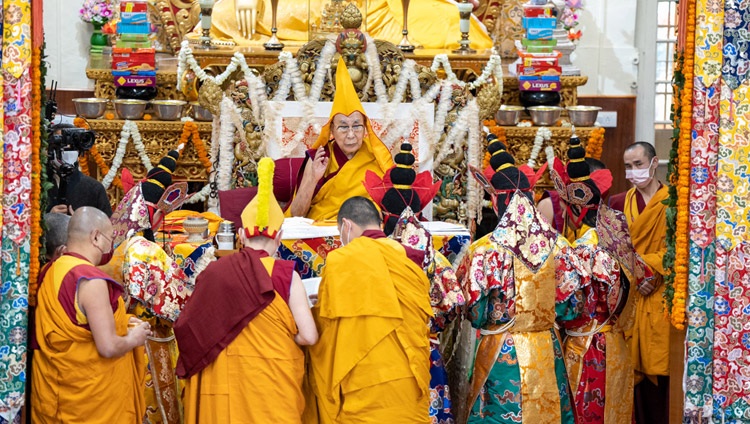 Monks dressed as dakinis gathered before His Holiness the Dalai Lama during the Long Life Prayer Offering at the Main Tibetan Temple in Dharamsala, HP, India on April 5, 2023. Photo by Tenzin Choejor
