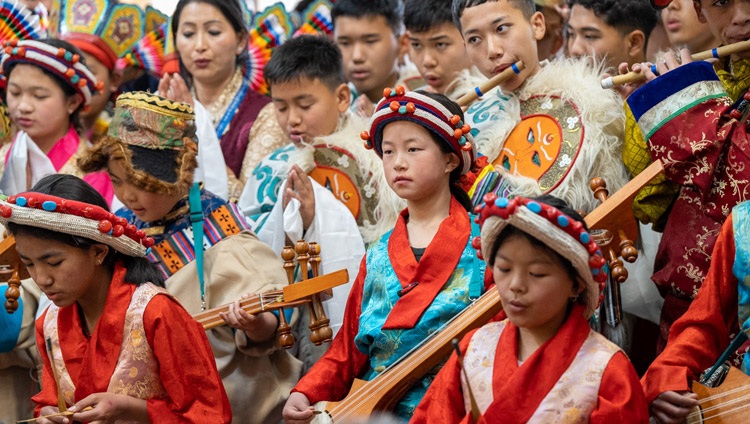 tudent musicians from the schools making the Long Life Prayer Offering to His Holiness the Dalai Lama singing and playing traditional instruments at the Main Tibetan Temple in Dharamsala, HP, India on April 5, 2023. Photo by Tenzin Choejor