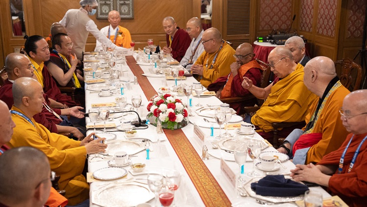 His Holiness the Dalai Lama joining the Heads of International Buddhist Delegations to the Global Buddhist Summit 2023 for lunch at the Ashok Hotel in New Delhi, India on April 21, 2023. Photo by Tenzin Choejor