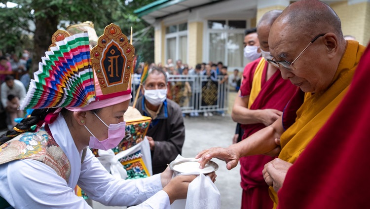 Tibetans in traditional costume offering His Holiness the Dalai Lama ‘Chema Changpu’, a traditional welcome as he arrives at the Main Tibetan Temple courtyard on the first day of teachings for Tibetan youth in Dharamsala, HP, India on May 30, 2023. Photo by Tenzin Choejor