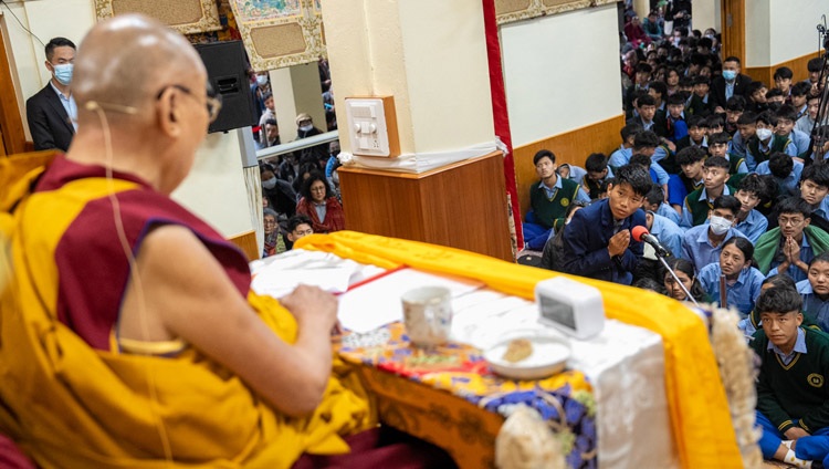 A student asking His Holiness the Dalai Lama a question on the first day of teachings for Tibetan Youth at the Main Tibetan Temple in Dharamsala, HP, India on May 30, 2023. Photo by Tenzin Choejor