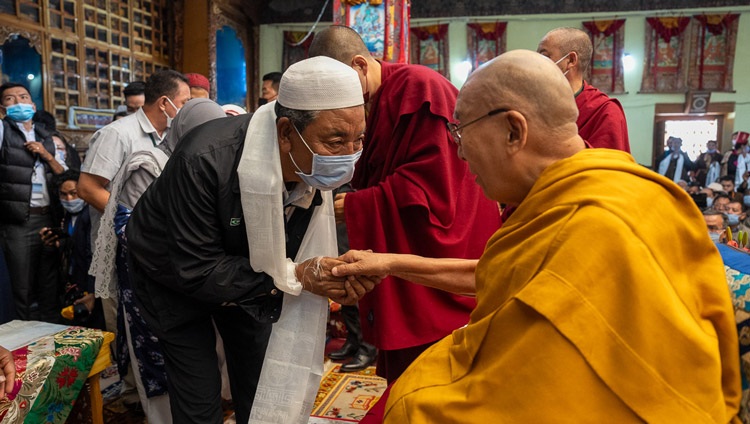 A member of the Muslim community greeting His Holiness the Dalai Lama at the start of his visit to the Jokhang in Leh, Ladakh, India on July 14, 2023. Photo by Tenzin Choejor