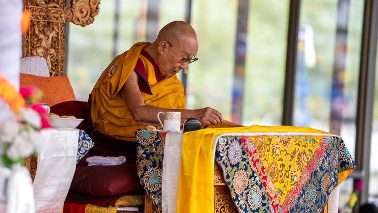 His Holiness the Dalai Lama commenting on the text "Thirty-seven Practices of All Bodhisattvas" on the first day of teachings at the Shewatsel Teaching Area in Leh, Ladakh UT, India on July 21, 2023. Photo by Tenzin Choejor