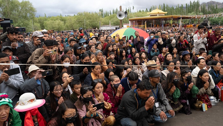Some of the crowd of about 65,000 waiting for His Holiness the Dalai Lama to arrive at the Shewatsel Teaching Ground on the second day of teachings in Leh, Ladakh, India on July 23, 2023. Photo by Tenzin Choejor