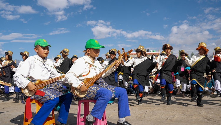 A group of Tibetan school-children performing during His Holiness the Dalai Lama's visit to Tibetan Children's Village School (TCV) Choglamsar in Leh, Ladakh, India on July 26, 2023. Photo by Tenzin Choejor