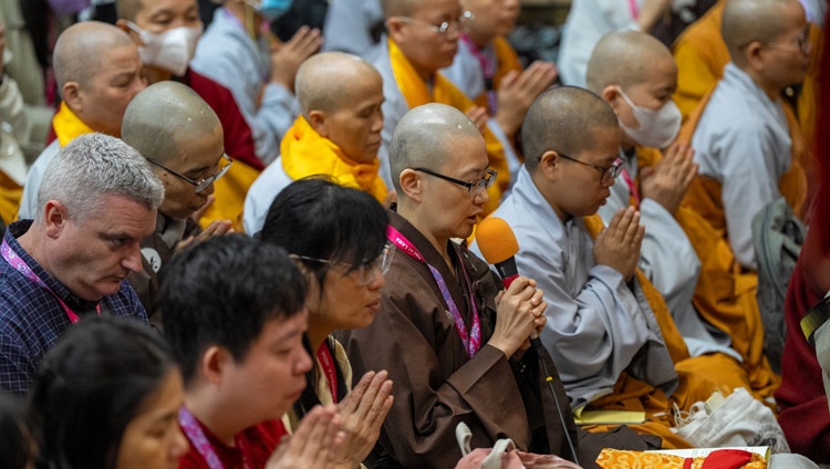 Members of the audience inside the Main Tibetan Temple chanting the Heart Sutra in Chinese at the start of His Holiness the Dalai Lama's teaching at the request of Southeast Asians in Dharamsala, HP, India on September 5, 2023. Photo by Tenzin Choejor