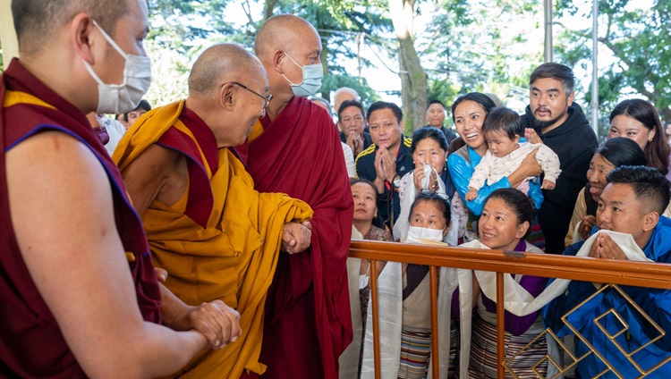 His Holiness the Dalai Lama greeting members of the crowd gathered in the courtyard of Main Tibetan Temple to attend the second day of teachings in Dharamsala, HP, India on September 6, 2023. Photo by Tenzin Choejor